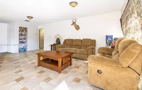 Living - 7349 Pine Valley Dr, Hialeah, FL 33015 photo 2 of 3