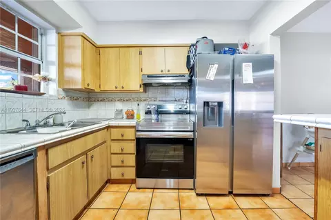 Kitchen - 5015 E Palm Ct, Hialeah, FL 33013 photo 1 of 3
