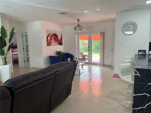 Living - 1014 W 68th St, Hialeah, FL 33014 photo 3 of 3