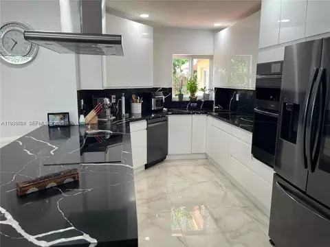 Kitchen - 1014 W 68th St, Hialeah, FL 33014 photo 2 of 5
