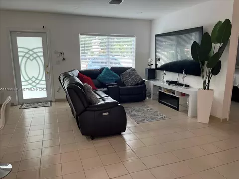 Living - 1014 W 68th St, Hialeah, FL 33014 photo 2 of 3