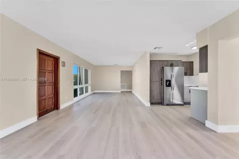 Living - 40 W 58th St, Hialeah, FL 33012 photo 3 of 4