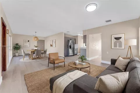 Living - 40 W 58th St, Hialeah, FL 33012 photo 1 of 4