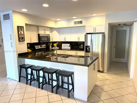 Kitchen - 6417 Windmill Gate Rd, Miami Lakes, FL 33014 photo 2 of 4