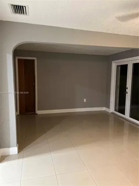 Living - 1900 W 72nd St, Hialeah, FL 33014 photo 2 of 4
