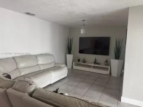Living - 412 W 15th St, Hialeah, FL 33010 photo 3 of 4