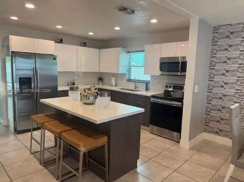Kitchen - 412 W 15th St, Hialeah, FL 33010 photo 1 of 2