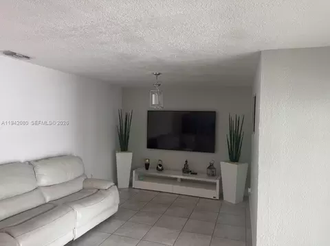 Living - 412 W 15th St, Hialeah, FL 33010 photo 4 of 4