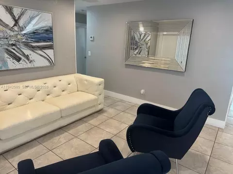 Living - 412 W 15th St, Hialeah, FL 33010 photo 2 of 4