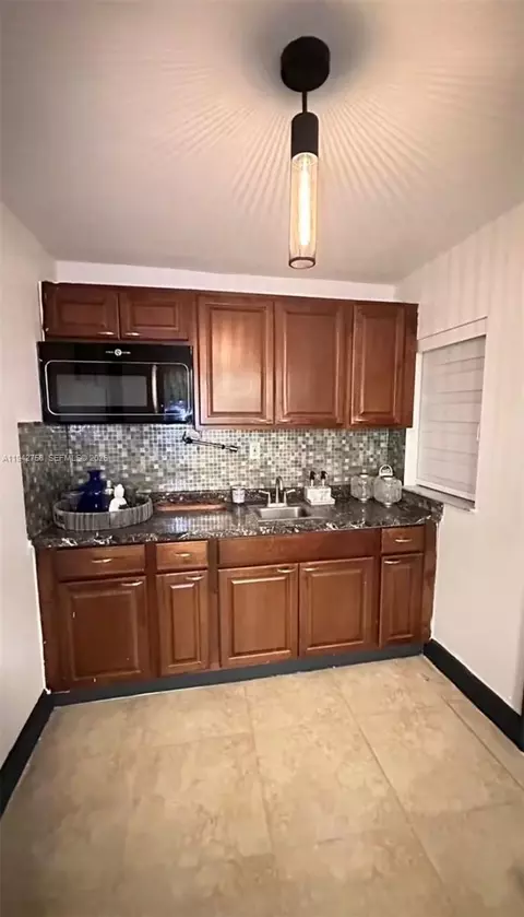 Kitchen - 747 E 19th St, Hialeah, FL 33013 photo 5 of 5