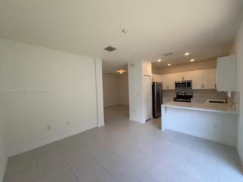 Living - 3326 W 112th St, Hialeah, FL 33018 photo 5 of 7