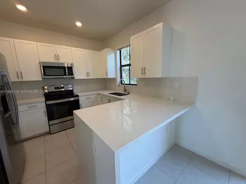 Kitchen - 3326 W 112th St, Hialeah, FL 33018 photo 2 of 4