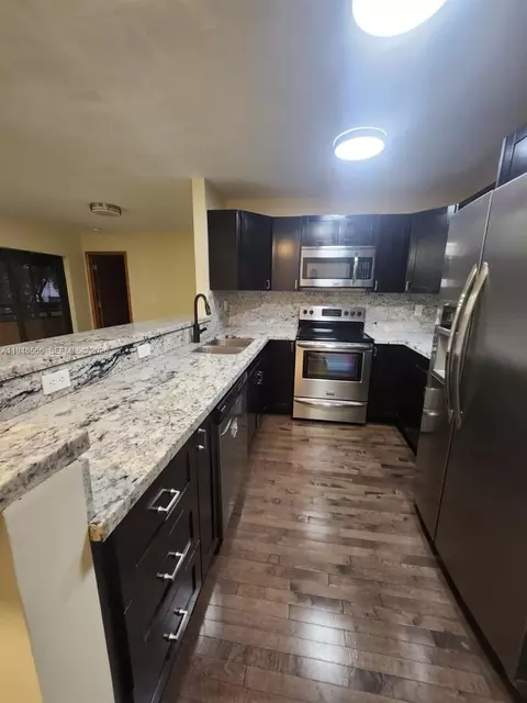 Kitchen - 20005 NE 3rd Ct #6, Miami, FL 33179 photo 1 of 2