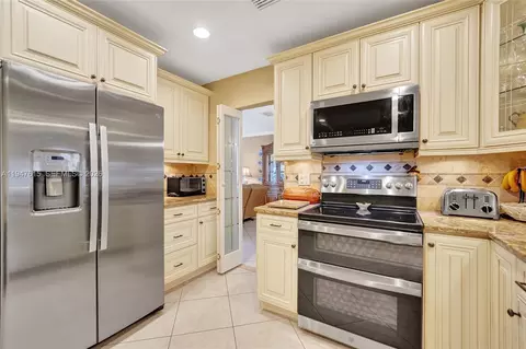 Kitchen - 230 SE 4th St, Dania Beach, FL 33004 photo 5 of 13