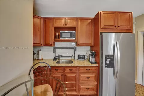 Kitchen - 230 SE 4th St, Dania Beach, FL 33004 photo 13 of 13