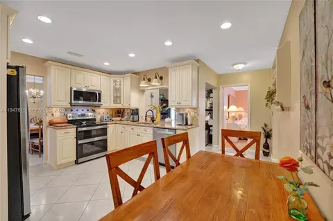 Kitchen - 230 SE 4th St, Dania Beach, FL 33004 photo 11 of 13