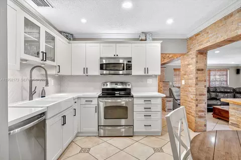 Kitchen - 1300 W 77th St, Hialeah, FL 33014 photo 2 of 4