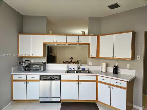 Kitchen - 6785 SE Warwick Ln, Stuart, FL 34997 photo 1 of 6