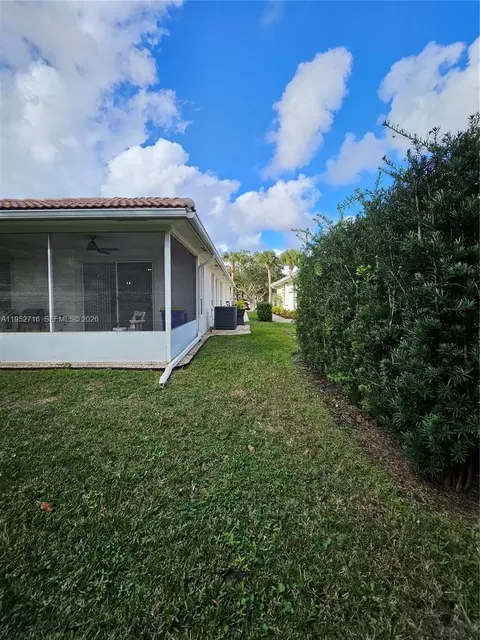 Exterior - 6785 SE Warwick Ln, Stuart, FL 34997 photo 6 of 9