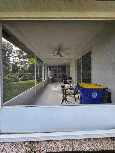 Exterior - 6785 SE Warwick Ln, Stuart, FL 34997 photo 5 of 9