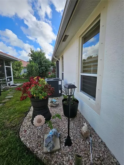 Exterior - 6785 SE Warwick Ln, Stuart, FL 34997 photo 3 of 9
