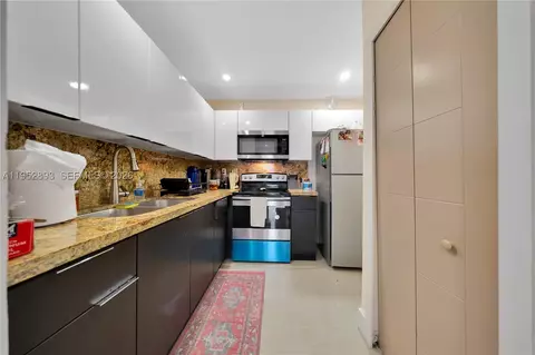 Kitchen - 458 E 20th St, Hialeah, FL 33013 photo 1 of 3