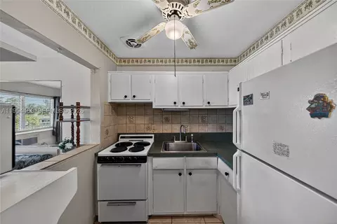Kitchen - 331 E Mcnab Rd #226, Pompano Beach, FL 33060 photo 1 of 3