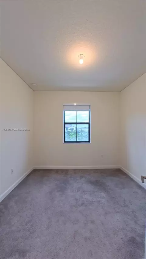 Bedroom - 3410 W 112th Pl, Hialeah, FL 33018 photo 6 of 7