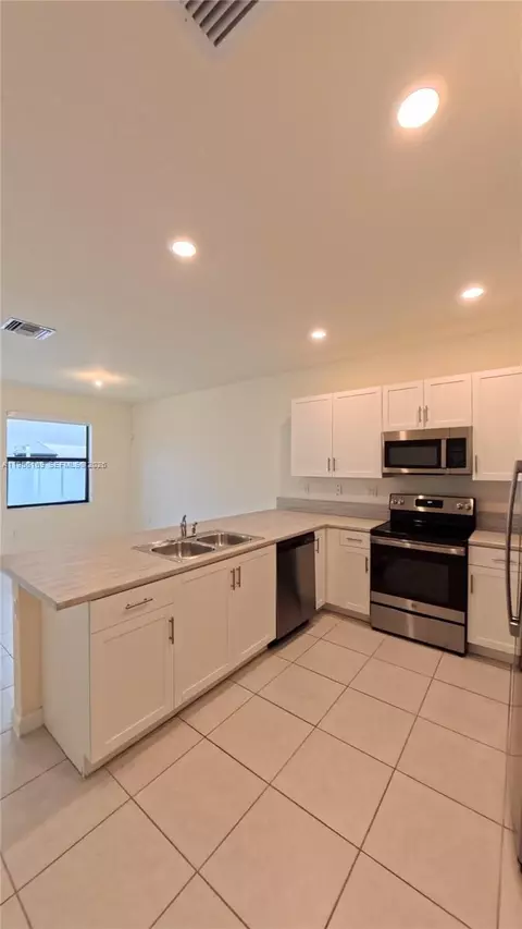 Kitchen - 3410 W 112th Pl, Hialeah, FL 33018 photo 1 of 1
