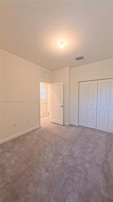 Bedroom - 3410 W 112th Pl, Hialeah, FL 33018 photo 5 of 7