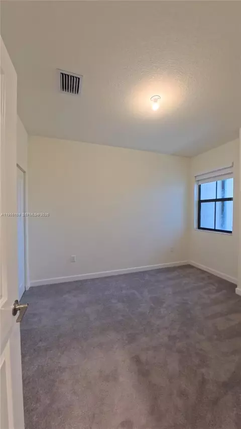 Bedroom - 3410 W 112th Pl, Hialeah, FL 33018 photo 4 of 7