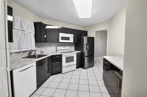 6555 W Broward Blvd #303, Plantation, FL 33317