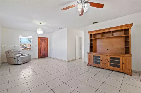 Living - 3880 E 8th Ln, Hialeah, FL 33013 photo 1 of 4