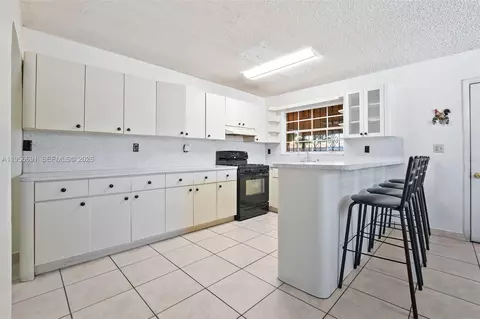 Kitchen - 3880 E 8th Ln, Hialeah, FL 33013 photo 1 of 3
