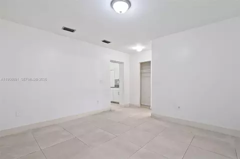 Living - 3880 E 8th Ln, Hialeah, FL 33013 photo 4 of 4