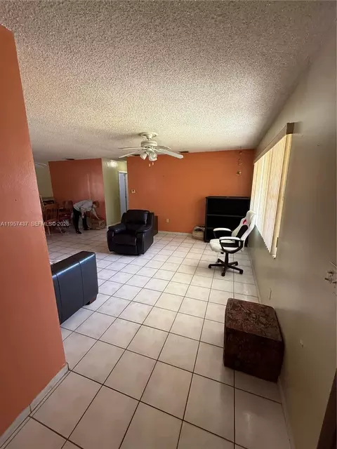 Living - 185 E 20th St, Hialeah, FL 33010 photo 2 of 3