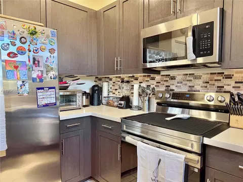 Kitchen - 11032 W 33rd Way, Hialeah, FL 33018 photo 3 of 3