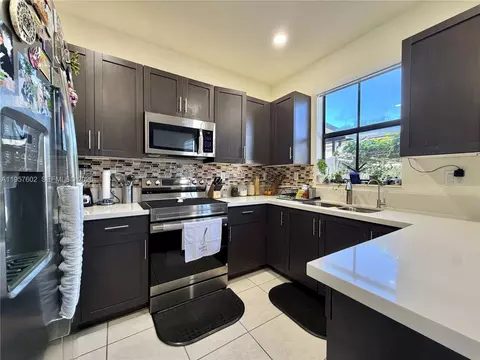Kitchen - 11032 W 33rd Way, Hialeah, FL 33018 photo 2 of 3
