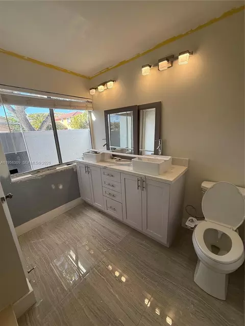 Bath - 18237 NW 61st Pl, Hialeah, FL 33015 photo 1 of 2