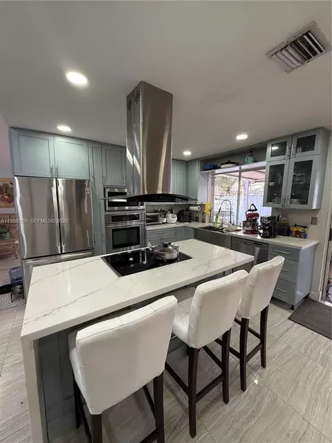 Kitchen - 18237 NW 61st Pl, Hialeah, FL 33015 photo 1 of 2