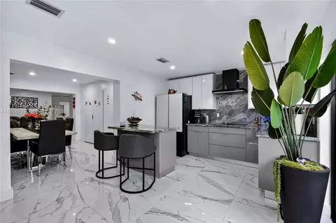 Kitchen - 1594 W 73rd St, Hialeah, FL 33014 photo 1 of 7