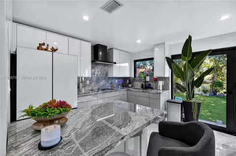 Kitchen - 1594 W 73rd St, Hialeah, FL 33014 photo 3 of 7