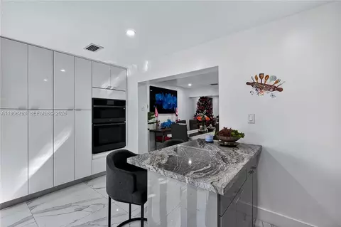 Kitchen - 1594 W 73rd St, Hialeah, FL 33014 photo 5 of 7