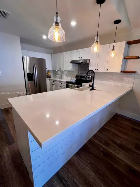 Kitchen - 2551 W 64th Pl, Hialeah, FL 33016 photo 3 of 3