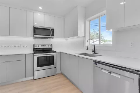 Kitchen - 5941 E 6th Ave, Hialeah, FL 33013 photo 1 of 3