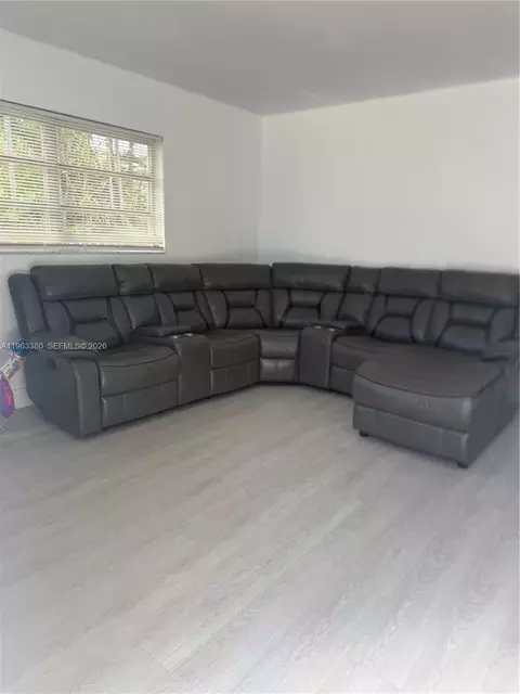 Living - 381 E 61st St, Hialeah, FL 33013 photo 1 of 2