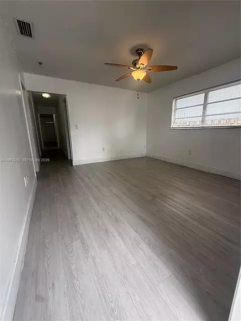Living - 381 E 61st St, Hialeah, FL 33013 photo 2 of 2