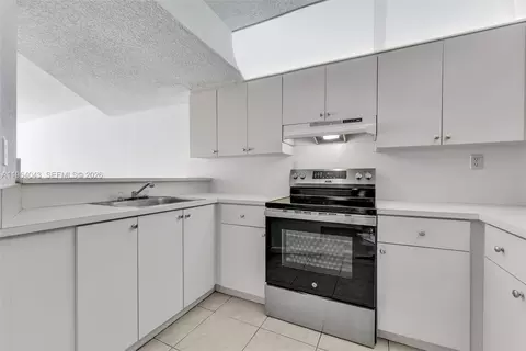 Kitchen - 240 W 68th St #207, Hialeah, FL 33014 photo 1 of 2