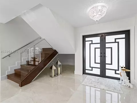 Entry Way - 6180 Pine Tree Dr, Miami Beach, FL 33140 photo 1 of 5