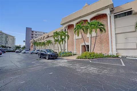300 Golden Isles Dr #102, Hallandale Beach, FL 33009